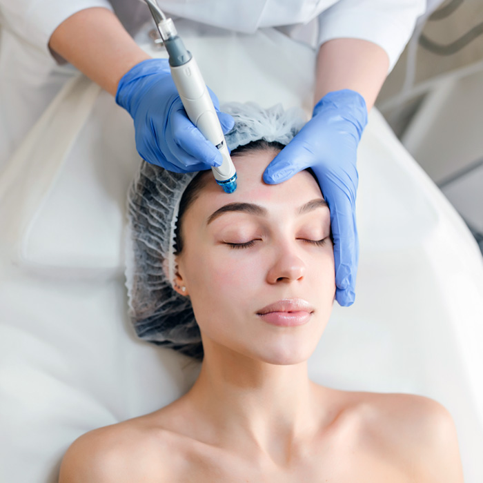 View from above of beautiful woman enjoying cosmetology procedures, rejuvenation in beauty salon. Dermatology, doctor at work, healthcare, therapy, botox. Place for text